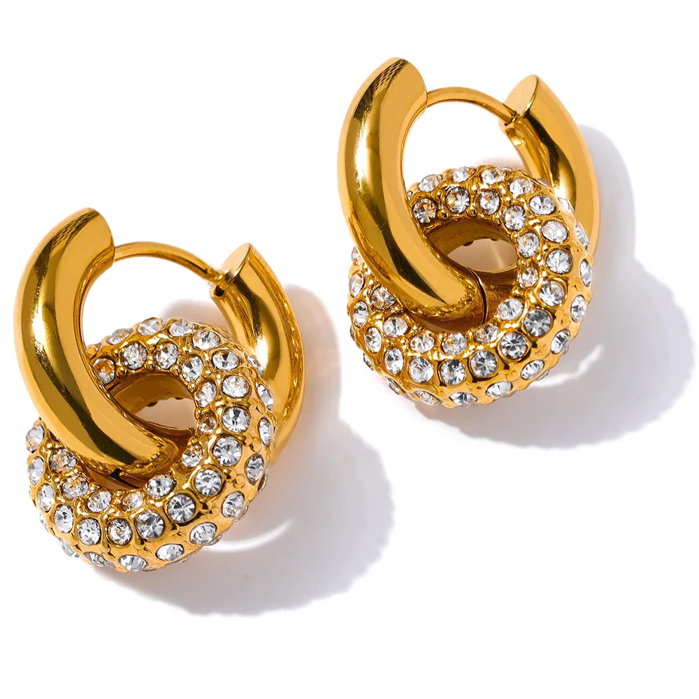 https://auracrystal.com.br/products/brinco-orania-com-detalhe-em-zirconia-banhado-em-ouro-18k-auramirage%C2%AE?_pos=1&_psq=orania&_ss=e&_v=1.0
