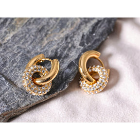 https://auracrystal.com.br/products/brinco-orania-com-detalhe-em-zirconia-banhado-em-ouro-18k-auramirage%C2%AE?_pos=1&_psq=orania&_ss=e&_v=1.0