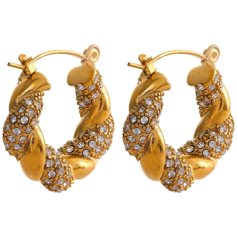 https://auracrystal.com.br/products/brinco-nyx-com-detalhe-em-zirconia-banhado-em-ouro-18k-auramirage%C2%AE?_pos=1&_psq=nyx&_ss=e&_v=1.0