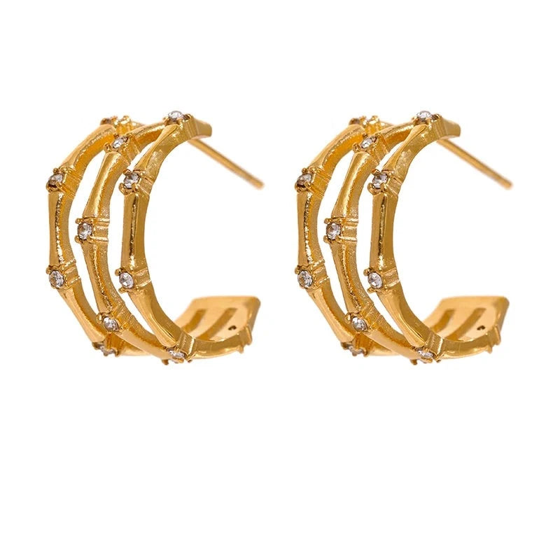 https://auracrystal.com.br/products/brinco-rhea-banhado-em-ouro-18k-auramirage%C2%AE