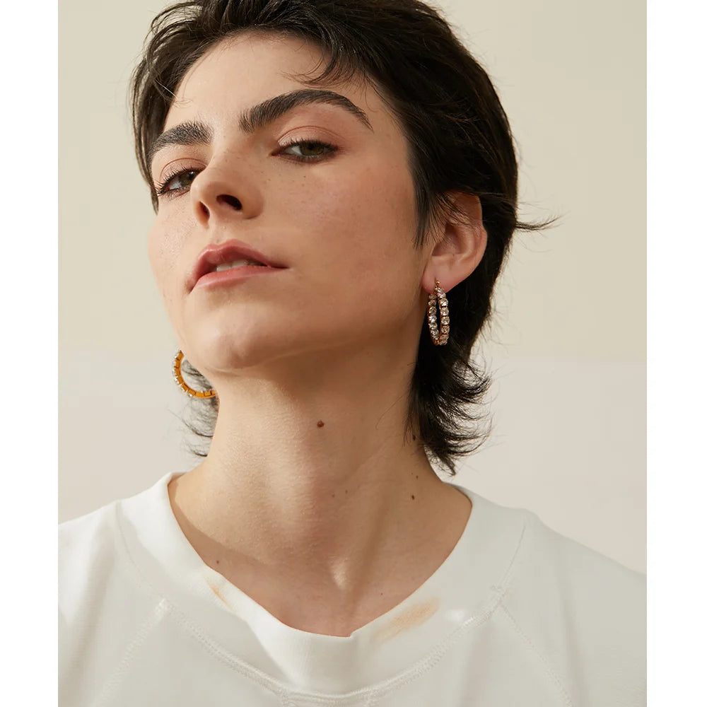 https://auracrystal.com.br/products/brinco-elysia-com-detalhe-em-zirconia-banhado-em-ouro-18k-auramirage%C2%AE?_pos=1&_psq=elysiza&_ss=e&_v=1.0