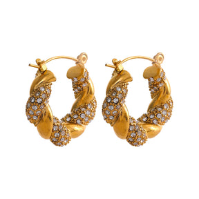 https://auracrystal.com.br/products/brinco-nyx-com-detalhe-em-zirconia-banhado-em-ouro-18k-auramirage%C2%AE?_pos=1&_psq=nyx&_ss=e&_v=1.0