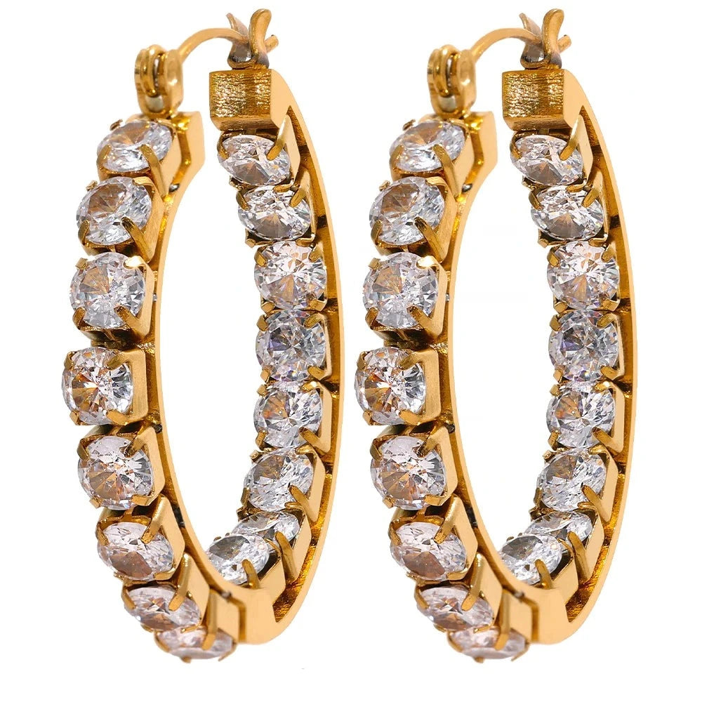 https://auracrystal.com.br/products/brinco-elysia-com-detalhe-em-zirconia-banhado-em-ouro-18k-auramirage%C2%AE?_pos=1&_psq=elysiza&_ss=e&_v=1.0