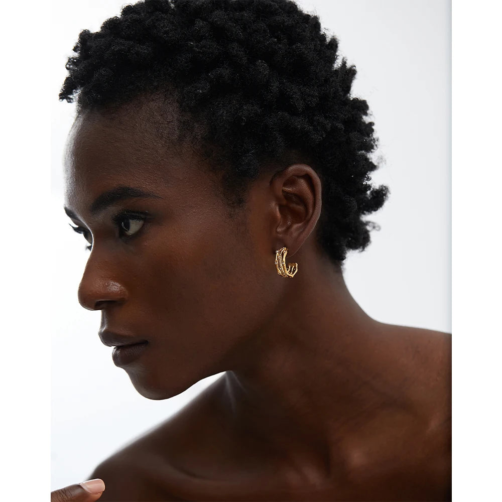https://auracrystal.com.br/products/brinco-rhea-banhado-em-ouro-18k-auramirage%C2%AE