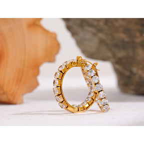 https://auracrystal.com.br/products/brinco-elysia-com-detalhe-em-zirconia-banhado-em-ouro-18k-auramirage%C2%AE?_pos=1&_psq=elysiza&_ss=e&_v=1.0