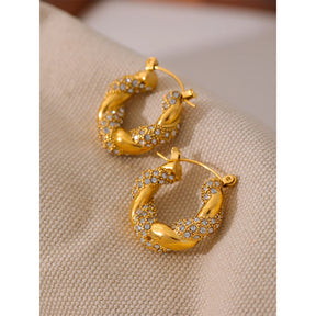 https://auracrystal.com.br/products/brinco-nyx-com-detalhe-em-zirconia-banhado-em-ouro-18k-auramirage%C2%AE?_pos=1&_psq=nyx&_ss=e&_v=1.0