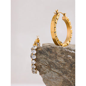 https://auracrystal.com.br/products/brinco-elysia-com-detalhe-em-zirconia-banhado-em-ouro-18k-auramirage%C2%AE?_pos=1&_psq=elysiza&_ss=e&_v=1.0