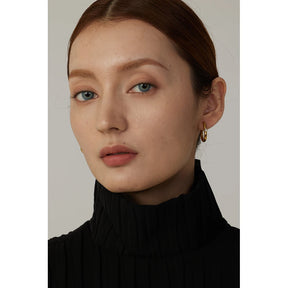 https://auracrystal.com.br/products/brinco-elara-com-detalhe-em-zirconia-banhado-em-ouro-18k-auramirage%C2%AE?_pos=1&_psq=elara&_ss=e&_v=1.0